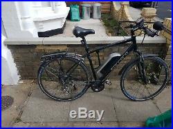 Carrera Crossfire-E Mens Electric Hybrid Bike. One year old in perfect condition